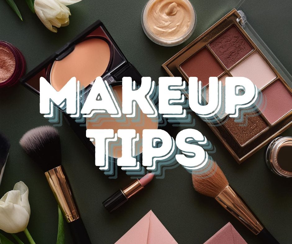 Flat lay image featuring various makeup products, including a powder compact, eyeshadow palette, brushes, and a lip product, arranged on a dark surface. The words "MAKEUP TIPS" are prominently displayed in white, bold, wavy text in the center. Image by Rya Eisma of Shamelessly Sexy Boudoir Photography, Las Vegas, NV